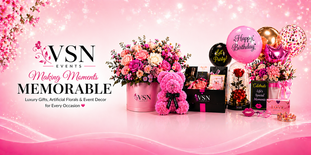 VSN Events display of luxury gifts and floral decor on a pink background